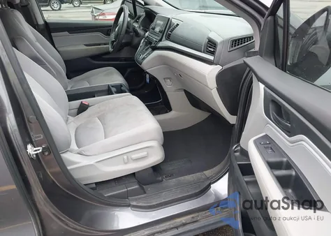 2018 Honda Odyssey Lx z USA, uszkodzony, nr VIN 5FNRL6H21JB034782